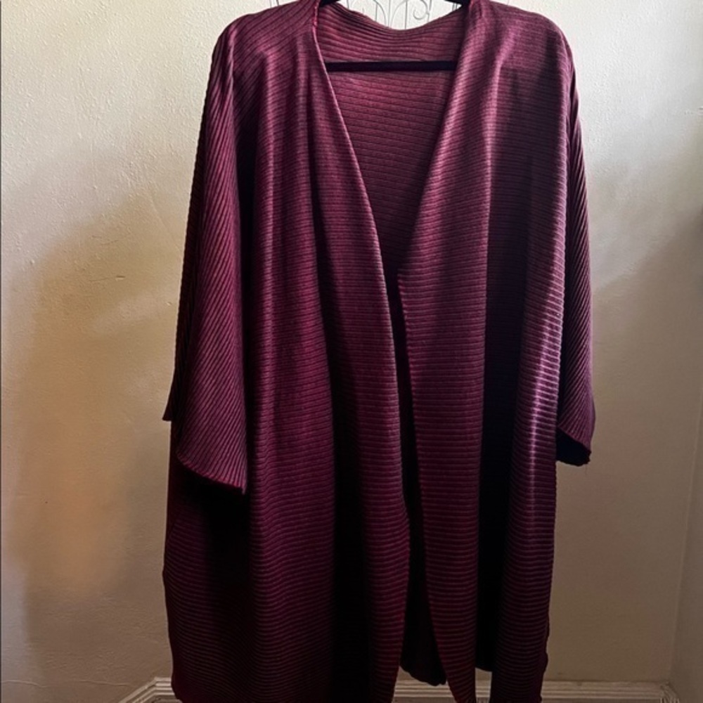Ona dolman-style brick-red cape, one size fits most